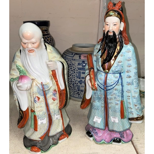 385 - Two Chinese porcelain figures of immortals 32 x 37cm; a 19th century jar