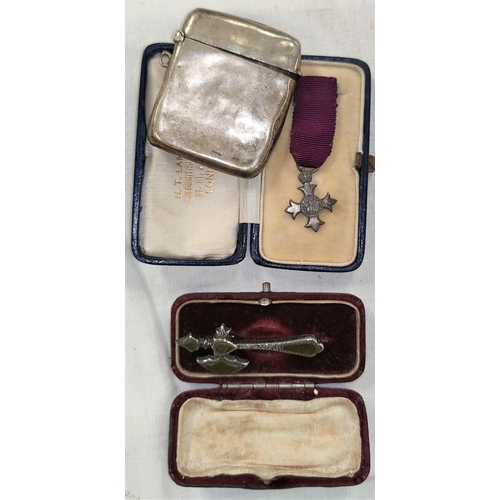 145 - An OBE miniature medal in original case, a silver axe brooch and a silver vesta
