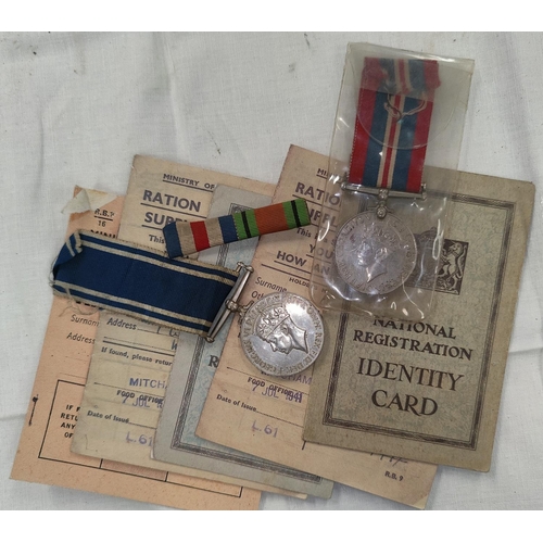 149 - A GVI Police Long Service and Good Conduct medal to SERGT. James Mitchell, a WWII medal and contempo... 