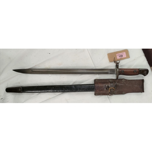 159 - A British 1907 pattern Bayonet, wood sides to handle, steel mounted leather scabbard; blade 43cm. 
M... 