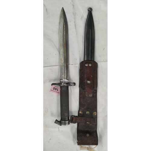 160 - A knife Bayonet, with steel handle and offset sprung clip, steel and leather scabbard; blade 21cm. 
... 
