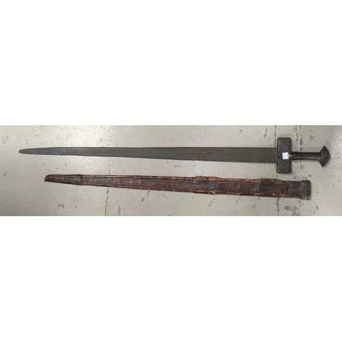 179B - A 19th century Mid Eastern/Sudanese sword in embossed leather scabbard, overall length of sword 97cm