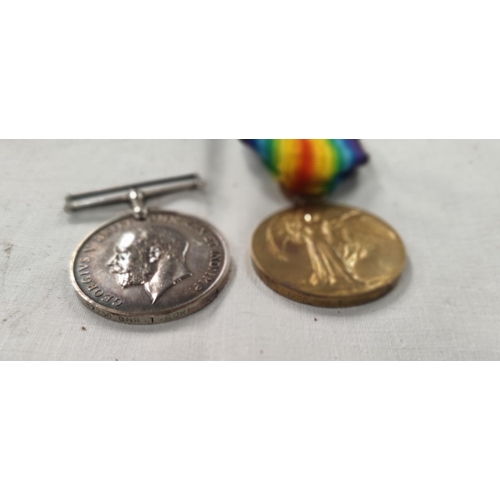 189 - A WWI pair of medals to 87235 GNR. T. Rowe R.A. died 25th April 1918