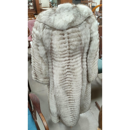 42C - A modern full length pale fur coat, herringbone pattern size 12