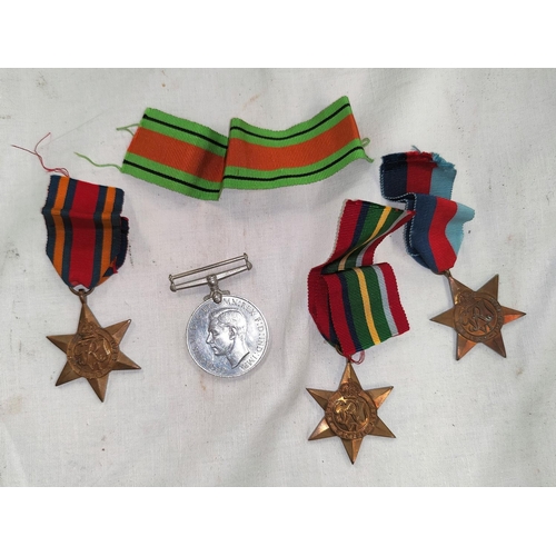 193 - A WWII Burma Star, 2 others and a Defence Medal