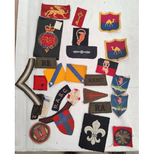 200 - A collection of British army cloth badges