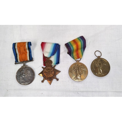 202 - A WWI silver War Medal to G. 27622 PTE G. MARTIN Middx R., a 15 Star RFA and 2 Victory medals- Hayes... 