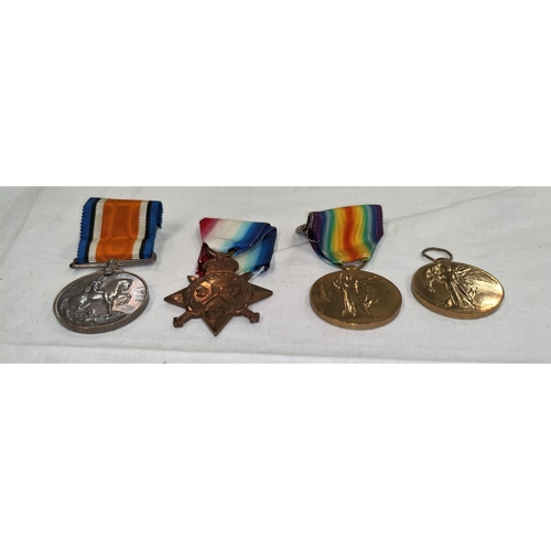 202 - A WWI silver War Medal to G. 27622 PTE G. MARTIN Middx R., a 15 Star RFA and 2 Victory medals- Hayes... 