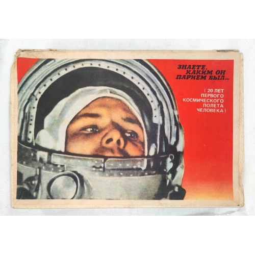 217A - SOVIET COSMONAUTS: a large matchbox paper over wood with a photograph of Yuri Gagarin and 23 similar... 