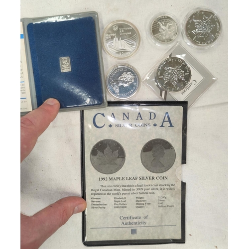 236 - CANADA: 2 X 1992 Maple Leaf silver coins, an Olympics $5 1976 anothe dollar 1975, 2 other items