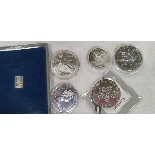236 - CANADA: 2 X 1992 Maple Leaf silver coins, an Olympics $5 1976 anothe dollar 1975, 2 other items
