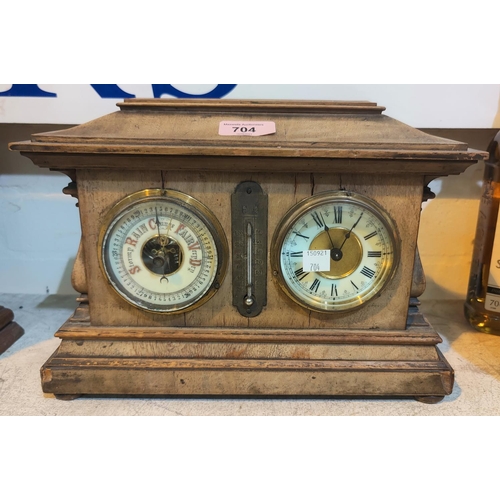 704 - An Edwardian clock/barometer/thermometer in stained wood case