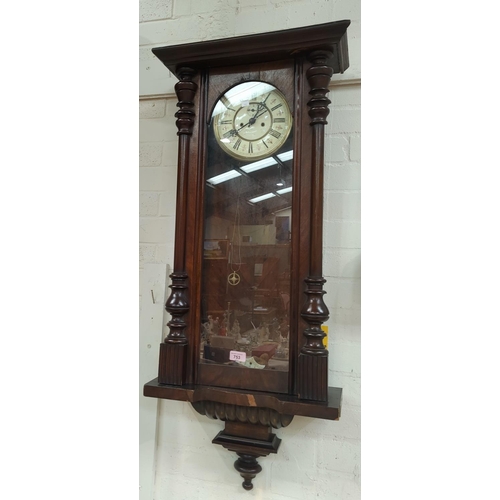 753 - A 19th century Vienna wall clock with double weight driven movement (no crest)
