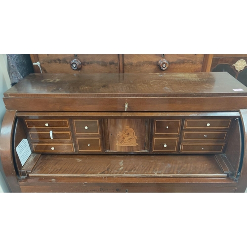 841A - A mahogany cylinder bureau