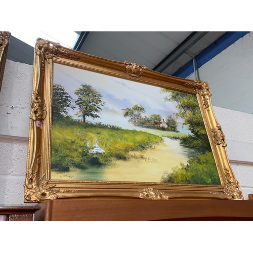 656 - D Hyde: A pair of oils on canvas of country scenes in gilt frames 50x75cm