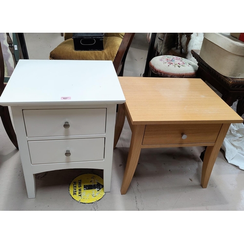 827 - A 2-height bedside cabinet in white finish and a similar lightwood cabinet