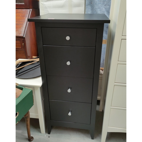 830 - A tall narrow 4 height chest of draewers in black finish