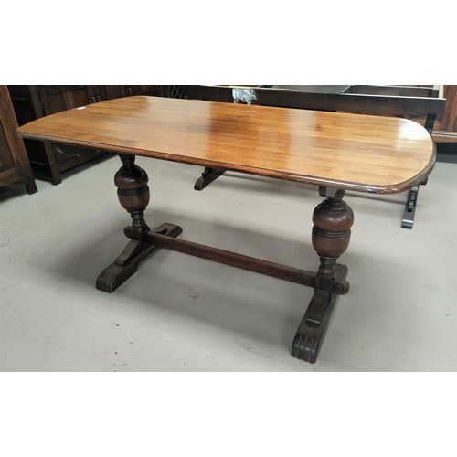 816 - A reproduction oak dining suite with linen fold decoration comprising refectory table; 6 ladder back... 