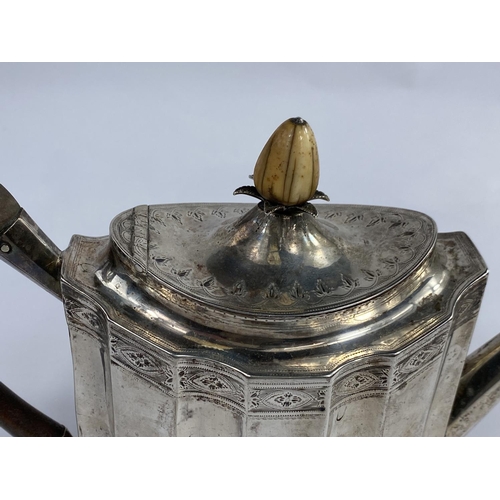644 - A Georgian oval ribbed teapot with chased decoration and crest, London 1810, 14.5 oz - this teapot h... 