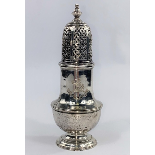 645 - A Georgian crested sugar dredger with pierced domed top and circular foot, London 1733, 5.6 oz, make... 