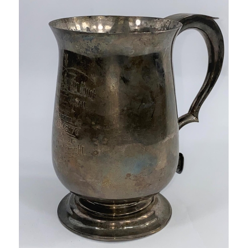 647 - A Victorian 1 quart baluster mug on raised circular foot, with presentation inscription, London 1895... 
