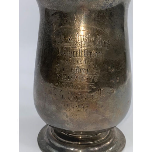 647 - A Victorian 1 quart baluster mug on raised circular foot, with presentation inscription, London 1895... 