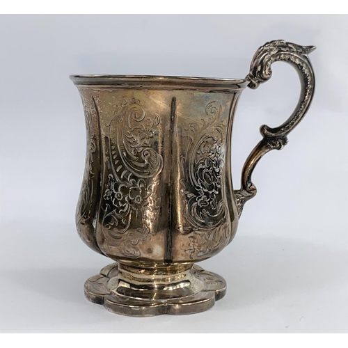 650 - A Victorian hallmarked silver christening mug of baluster ribbed form, chased acanthus decoration, o... 