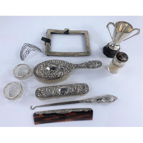 675 - Two hall marked silver brushes, a similar silver
mounted comb and button hook, a hall marked silver ... 