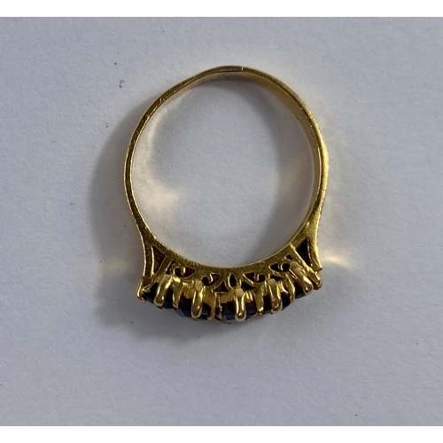682 - A yellow metal dress ring stamped 