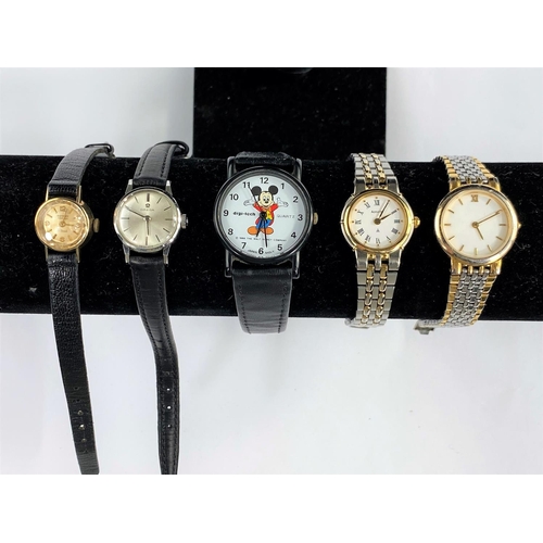 694 - A ladies omega stainless steel wrist watch; a modern Mickey Mouse wrist watch and three other ladies... 