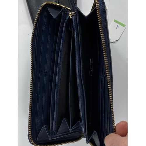 697 - Leather purses: One large navy blue Biba ladies purse and a small black Antonini Italian calf leathe... 