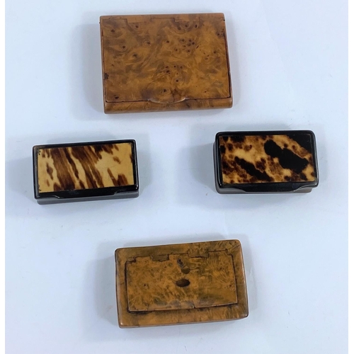 76 - A walnut snuff box with tortoise shell lining, a similar walnut snuff box and two other horn boxes.