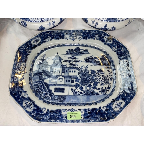 544 - A Chinese blue and white ceramic rectangular dish with canted corners, decorated with traditional sc... 