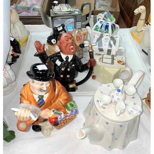 501 - 9 Novelty teapots including 3 Wade English Life teapots, television, desk etc