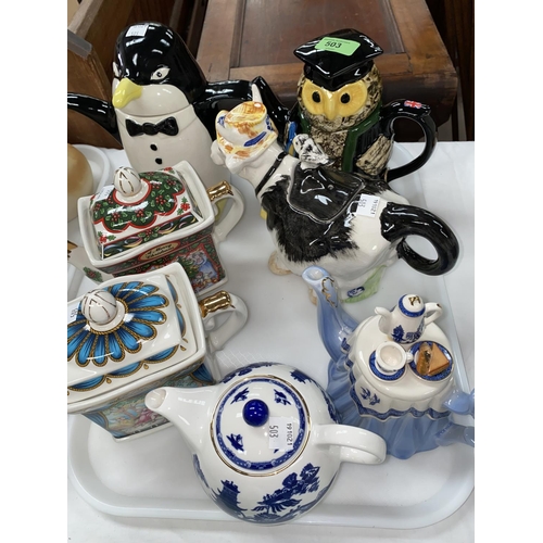 503 - 9 Novelty teapots including an Owl, Penguin, cow etc