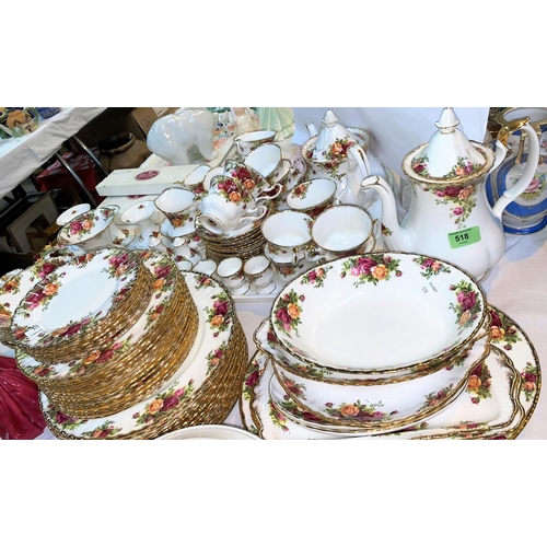 518 - A large Royal Albert 'Old Country Roses' dinner and tea service which includes serving dishes, posy ... 