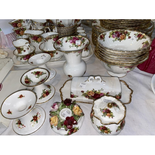 518 - A large Royal Albert 'Old Country Roses' dinner and tea service which includes serving dishes, posy ... 