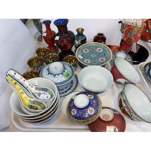 528 - A selection of oriental rice bowls; china and cloisonné