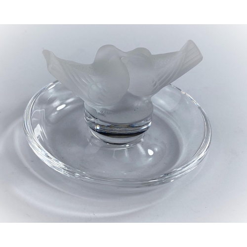 591A - A circular Lalique pin dish surmounted by a pair of courting birds, signed in script 
