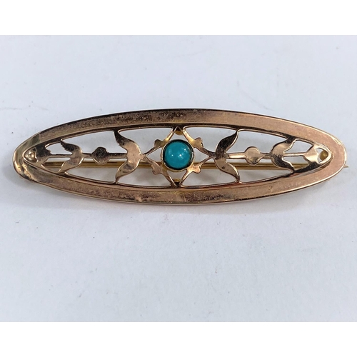 646A - An oval yellow metal brooch set with a central turquoise stone flanked by leaves, stamped T G, 9ct, ... 