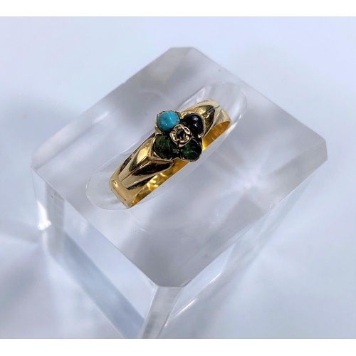 691c - A 22 carat hallmarked gold dress ring set with a turquoise and 4 other colour stones, with letters e... 