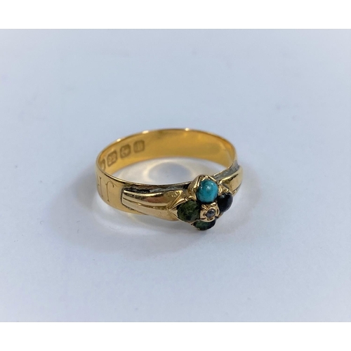 691c - A 22 carat hallmarked gold dress ring set with a turquoise and 4 other colour stones, with letters e... 