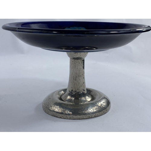 514 - A Moorcroft Moonlit Blue pattern cake dish on a Tudric pewter pedestal stand.