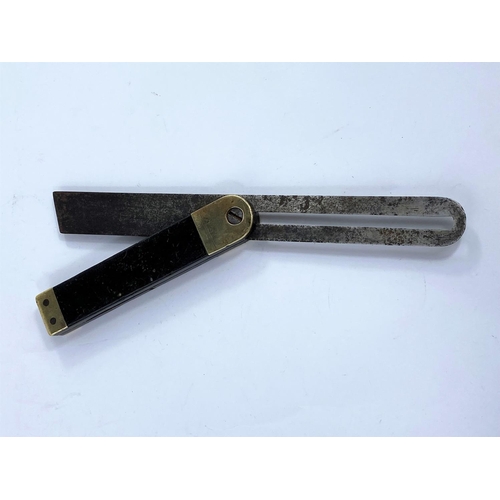 590A - A 19th century adjustable angle forming steel sliding bevel with ebony and brass stock.