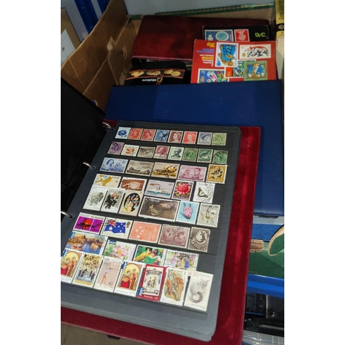 248 - A World selecion of stamps collected into albums and stock books, unsorted tin of stamps etc