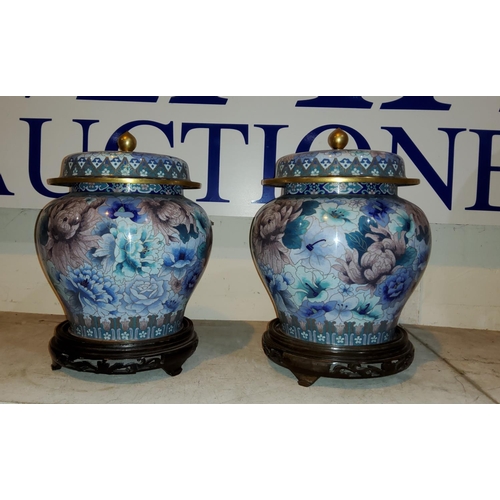 188 - A near matching pair of Chinese cloisonne lidded vases with hard wood stands brass highlights       ... 