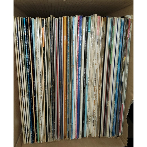 49 - A selection of vintage pop and other records including Abba, ELO, Elvis etc