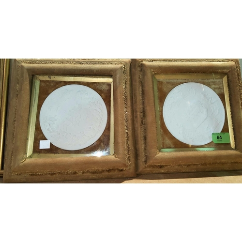 64 - A circular pair of relief plaques depicting classical scenes, framed and glazed; a small watercolour... 
