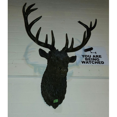 732 - A 20th century animalier style wall hanging bronze, depicting a Stag's head with eight point antlers... 