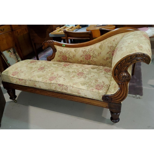 789 - A Victorian walnut chaise longue with scrolled griffin carved back and floral cushions